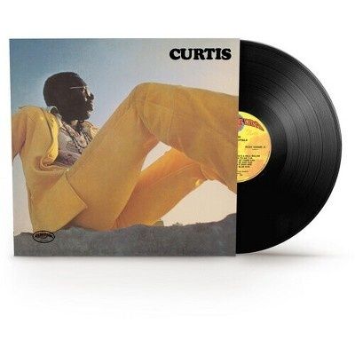 Omslag og svart vinylplate fra Curtis, med en person i gul drakt